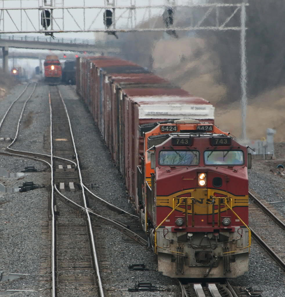 Sunday morning Warbonnet foreign power: CN train 391 backs on to his train at Snake after lifting some hi-cube auto parts cars in Aldershot yard;  bound for Ford in St Thomas.  BNSF 743 / 5424 ; CN auto train 271 is approaching in the background.