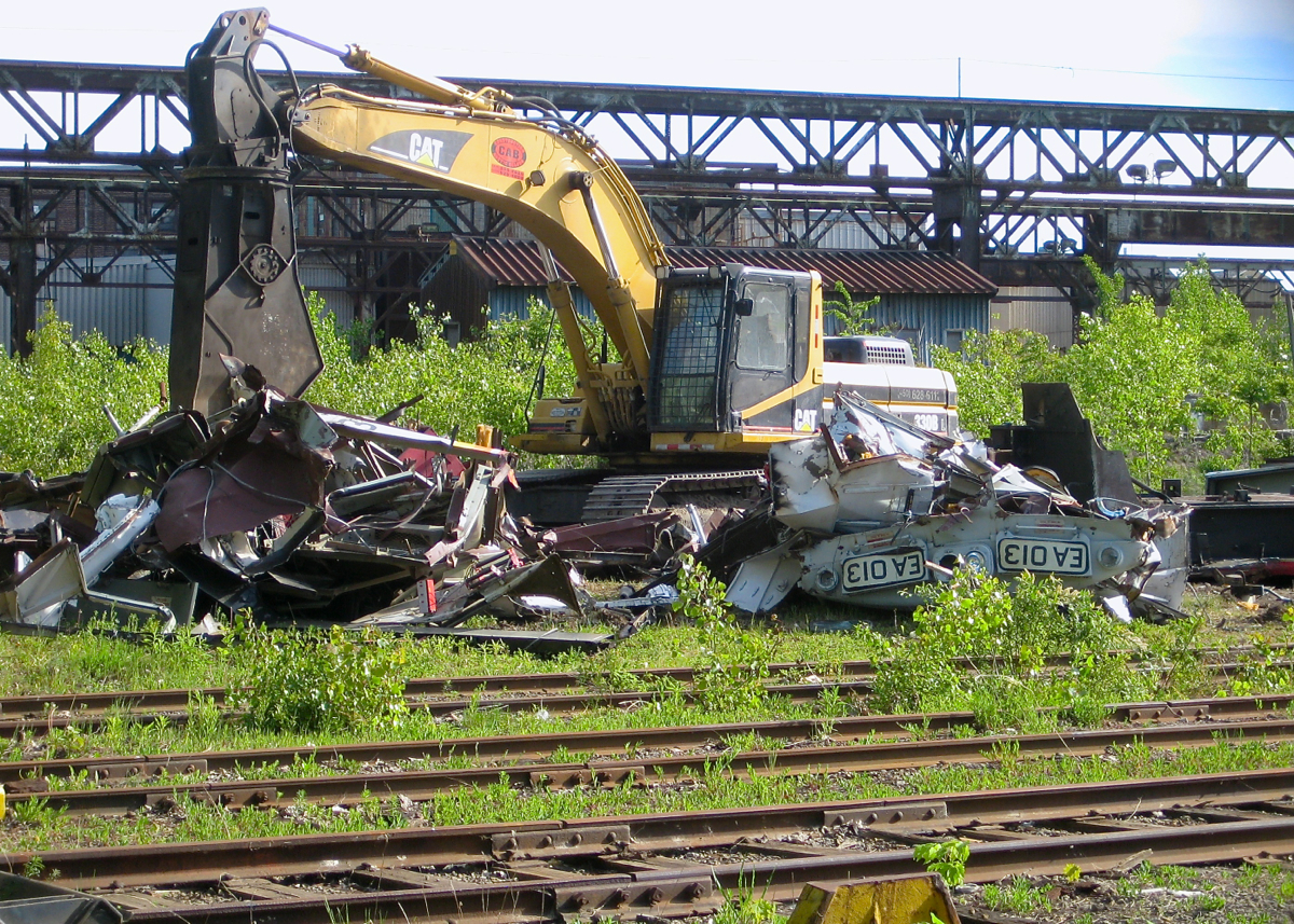 End of the line for an underused electric engine. A GE E60C-2 that was built for Nacionales de México during the 1980's is being scrapped on the Dominion Bridge property in the spring of 2008. My future father-in-law (Glen Fisher) was involved in brokering these locomotives and attempting to sell/lease them to Montreal's AMT (commuter train agency) for use on the electrified Deux-Montagnes line. The AMT did not decide to use them and all were scrapped.