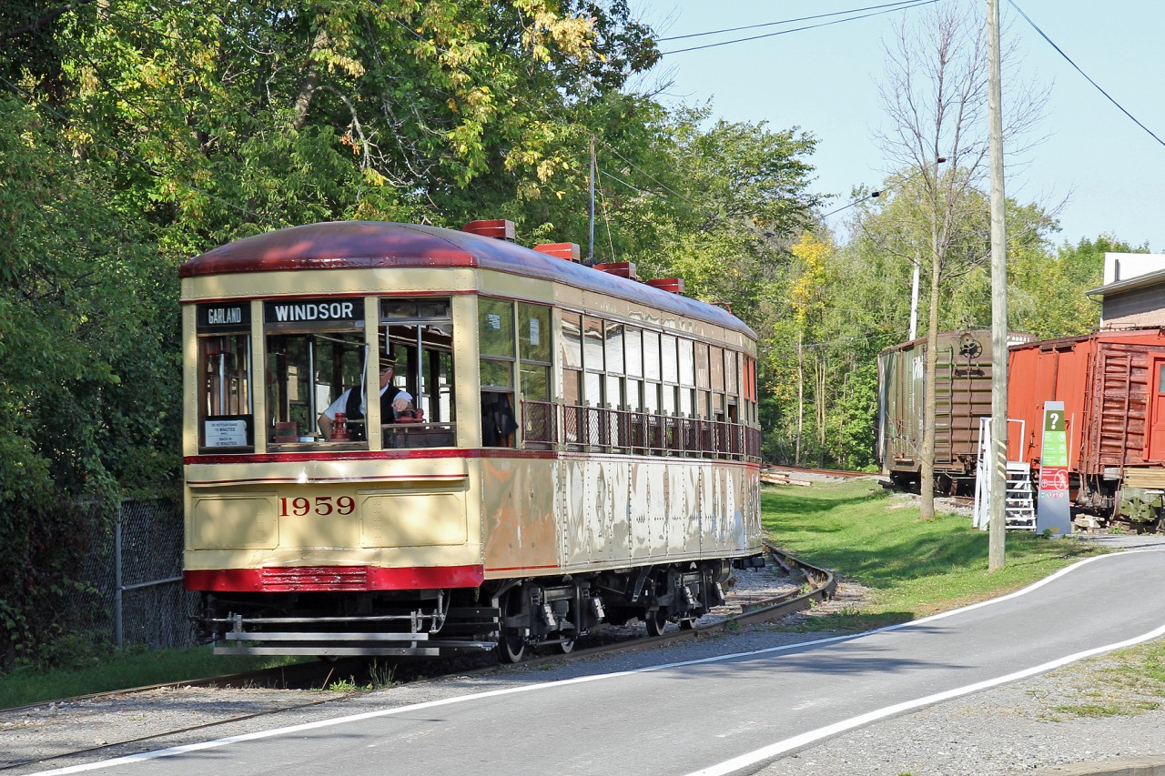 Ex MTC tram # 1959 makes its way round the site at Exporail.  Built in 1928 the tram was in service untill 1959 and aquired by the museum in 1963.  Since retoration in 2001 it has seen constant service providing rides around the exporail site.
