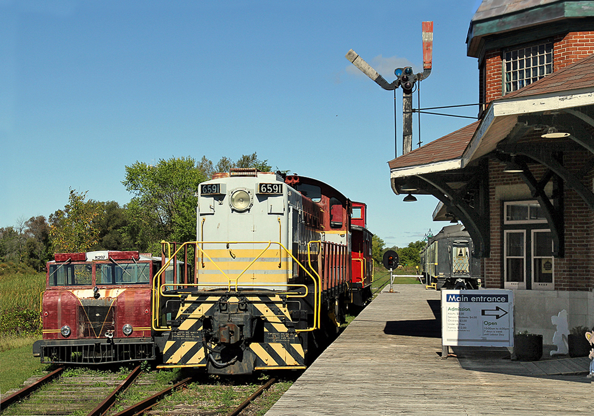 At the former CNoR Station in Smiths Falls, now the Railway Museum of Eastern Ontario, is MLW S-3 CP 6591.  Sitting beside it, not looking in great condition, is Wickham car M297 (also CP) built in England in 1955.