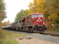 CP 8884 is leading Kansas City Southern 3916 down the Hamilton sub and around the bend past MM74 with its manifest of ethanol tankers after waiting for CP 9528 to clear upwards and in to Guelph Junction.