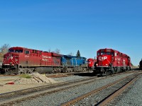 Road power waiting for their next turn of duty;  ES44AC CP 8747, AC4400CW CEFX 1043 and GP38-2 CP 7308, while on the near track, what seem to have become "resident" yard switchers GP20C-ECO CP 2235 and 2327.  (see also photo 18899)