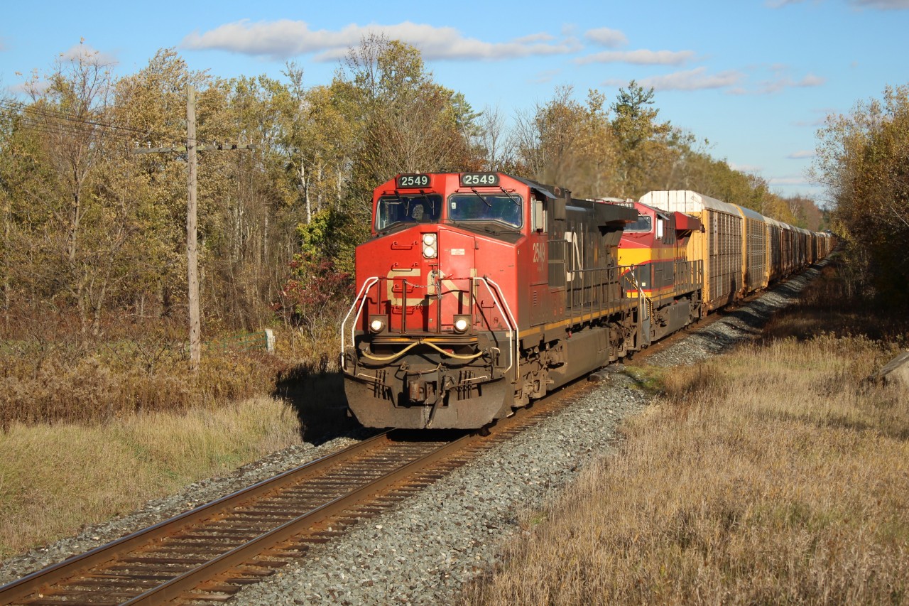 Here was a nice surprise on the Canadian Pacific line and CP 147. CN 2549 leading KCS 4831 past MM43 on the CP Galt sub on its daily run with auto racks cleared to Orrs Lake with no sign of faded CP red.