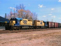 In what is about as good a meet as you would get, northbound ONR 1736 and 1734 have slowed, cut the ditch lights; awaiting southbound ONR 1730 and 1735 which is less than a minute around the bend. Matheson sation in background has just received a new roof and looks good for a few more years. It also is the town bus terminal.
(ONR 1736 went to Progress Rail in 2005) Northbound train en route to Cochrane.