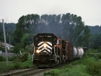 New Brunswick East Coast SD40 6901 leads train #402 (Campbellton - Miramachi) through Nash Creek. This train left Campbellton around 0700 and required a spirited chase along parallel Highway 11. 