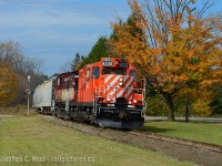 It is 1245 and OSR is on their way back to Guelph Junction leaning into the curve at Corhwin. The GJR is undergoing some major works at the moment, with tamping of the entire right of way in progress, with the goal to reach Class 3 track specifications.  OSR has been starting lately at 0500 making for relatively early returns from Guelph, perfect for catching some southbound action during fall colour season.