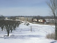 Soo Line SD40-2 760 is close to cresting the grade out of Hamilton on the former TH&B line. It is leading train #270 which was a runthrough train from Chicago to somewhere on the former D&H (I forget exactly where) that ran through the tunnel between Detroit and Windsor and then back into the US at Niagara Falls. 