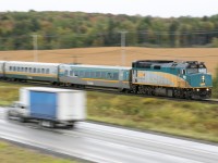 Daily Québec City to Montréal VIA train 25 makes its way west as it rolls along highway 20.