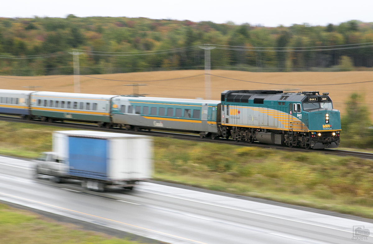 Daily Québec City to Montréal VIA train 25 makes its way west as it rolls along highway 20.