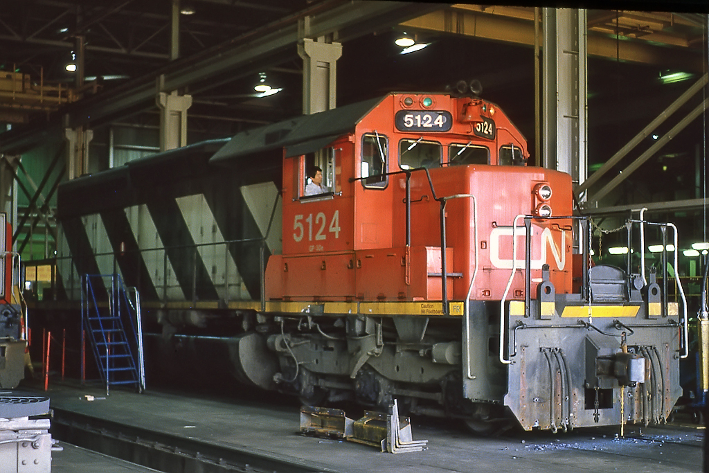 Plow is off, and 5124 is getting a lot of attention. The actually put footboards on it, and for a brief period used 2 SD40's for hump power. There was a shortage of serviceable GP38's and someone was trying to save a few dollars.