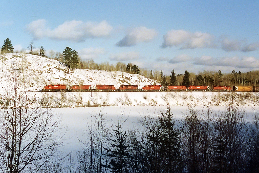A lashup that you could only dream of. 2 M630's are mixed in with 5 SD40's westbound.