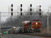 A few hours later on the same Sunday morning, March 25 2007....CN 394 passes Snake with BNSF 573 B40/ BNSF Sd40 and two CN GP9's..with work at Aldershot ahead. If I recall correctly..as I watched this train pass Burlington station, a certain "host" of this site ( no pun intended ) was at the station- in his toyota- also taking pictures of this train. 