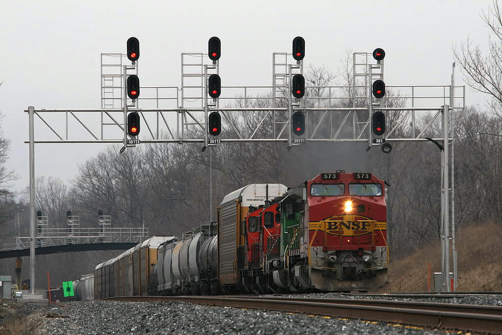 A few hours later on the same Sunday morning, March 25 2007....CN 394 passes Snake with BNSF 573 B40/ BNSF Sd40 and two CN GP9's..with work at Aldershot ahead. If I recall correctly..as I watched this train pass Burlington station, a certain "host" of this site ( no punn intended ) was at the station- in his toyota- also taking pictures of this train.