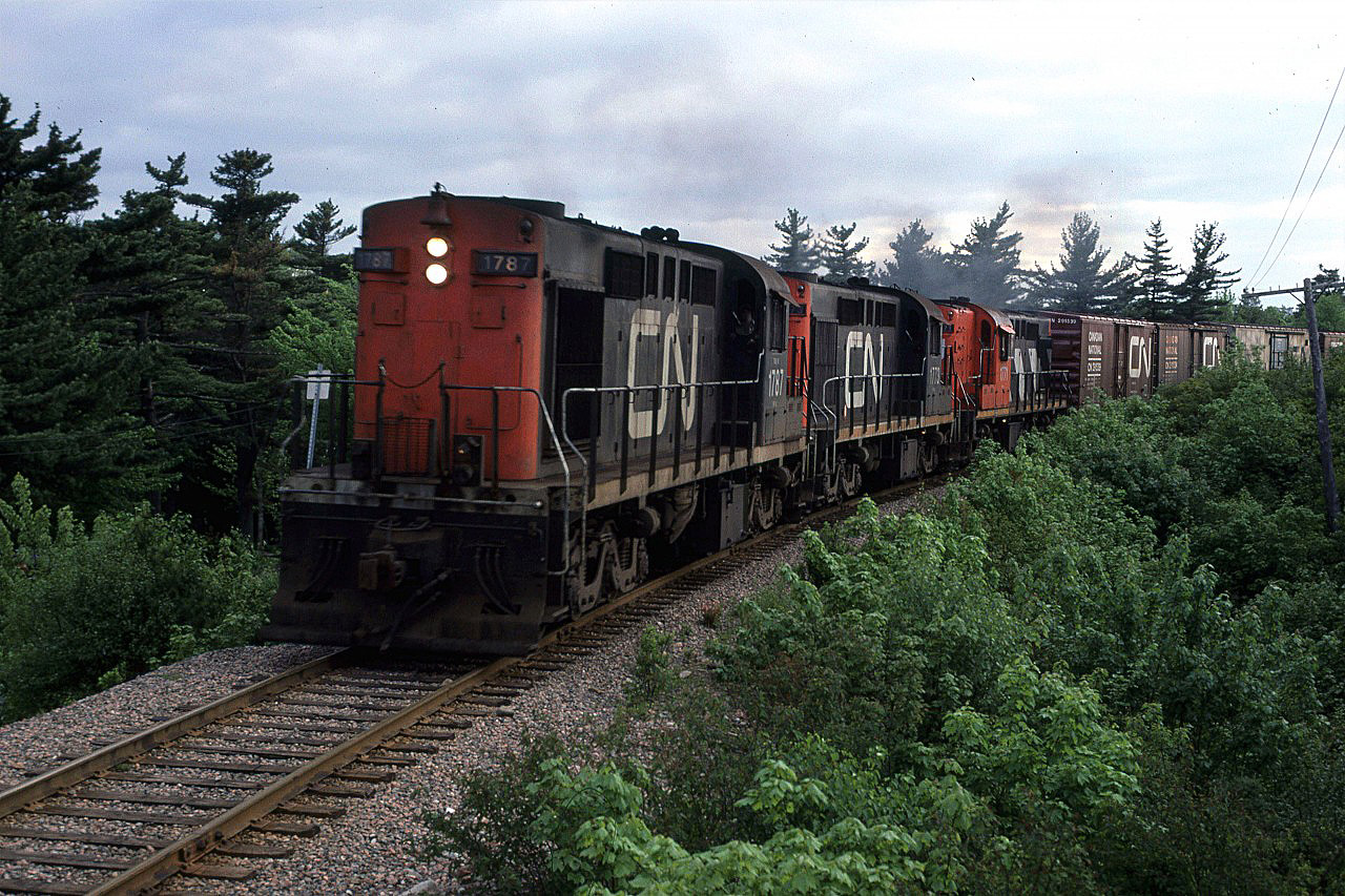 I watched this train go down the Chester Sub (at this time it was still a Sub, I believe) each morning and return around dinner time. This Evening, I decided to photograph it. This is the first photo as it came around a curve. It then stopped - presumably to get a clearance on the Bedford Sub. 
Unfortunately, this is the only evening that I would capture this train in half-way decent light.
