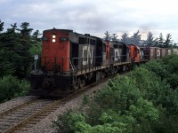 I watched this train go down the Chester Sub (at this time it was still a Sub, I believe) each morning and return around dinner time. This Evening, I decided to photograph it. This is the first photo as it came around a curve. It then stopped - presumably to get a clearance on the Bedford Sub. 
Unfortunately, this is the only evening that I would capture this train in half-way decent light.