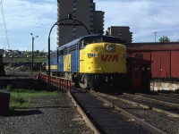 VIA 6773 rides the turntable after being serviced in the roundhouse at Fairview Shops.
The view from that apartment building in the background must have been tremendous to a certain portion of the population.