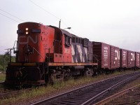 While waiting for a delayed ferry to Newfoundland, I had the opportunity to check out the CN tracks at the loading terminal. This RS-18 was bringing a string of boxcars to be loaded on a subsequent ferry.
The tracks from Truro to Sydney must be heavier iron than the branches out of Halifax, since they are not using RSC-14's