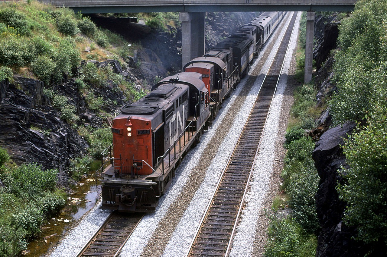 The westbound "Ocean ducks under Bayers Road in Halifax as it starts its journey to Montreal.
It was unusual to have 3 RS-18's on one train. Many times, one would lead as the FPA-4's were a little thin or needed service.