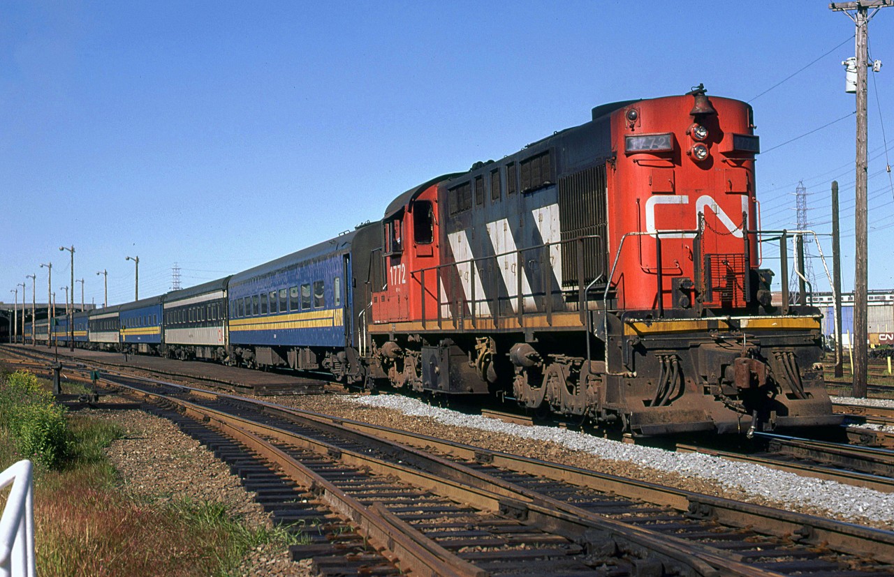 One of my few photos taken at the Halifax terminal/station, 1772 is coupled onto a string of passenger cars to shuffle them? or turn them?
