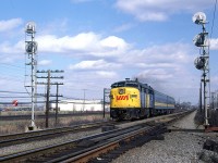 A short westbound VIA train splits the signal at Dorval crossovers.
The VIA station may be seen at far right, and does anyone remember Tilden Rent-a-car? It probably went the same way as Rent-a-wreck.