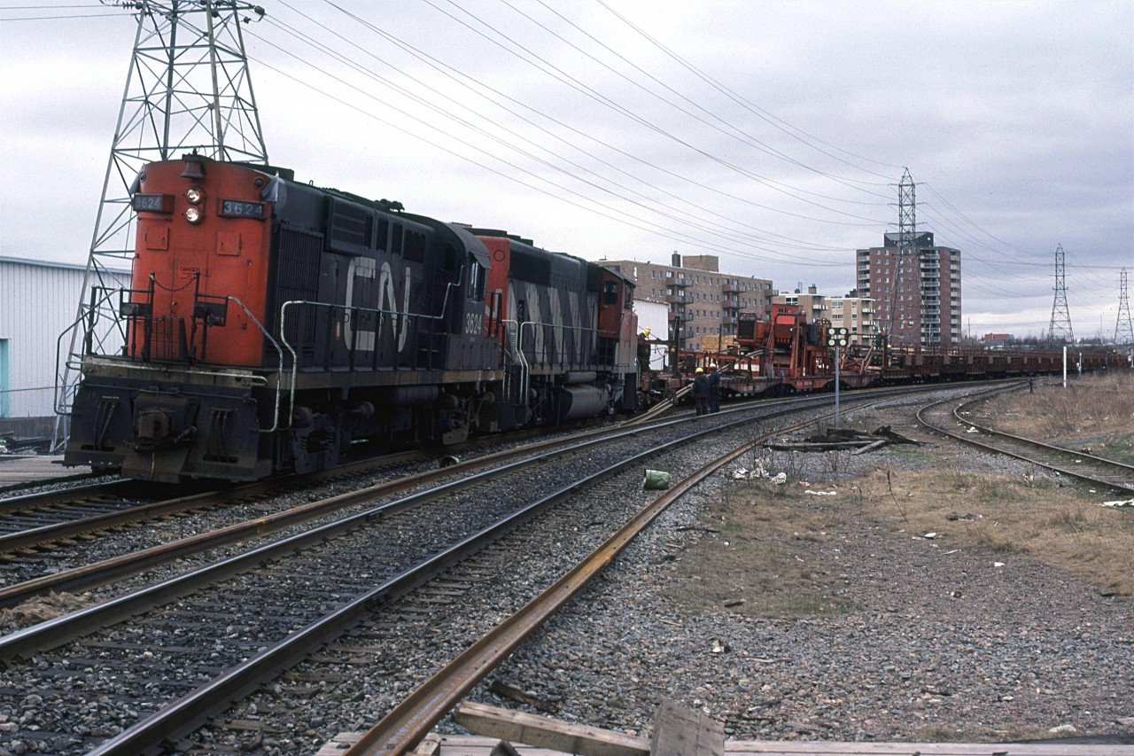 Halifax gets ribbon rail. 
Armdale platforms may be seen at the very bottom of the photograph and across the tracks, in front of CN 3624.
I do not recall what the track to the right was used for, if anything at the time.