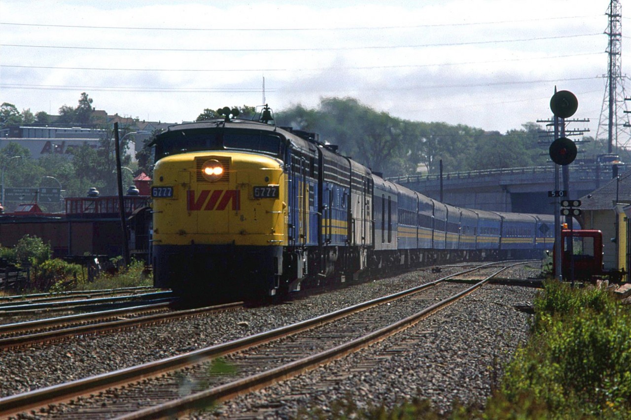 The westbound "Atlantic" in entering the south (RR east) end of Rockingham Yard. 
If you look carefully, you will se a part of a RSC-14 just to the left of the nose of the FPA-4. It is on the tracks leading to the container pier in the Bedford Basin, and track to the Navy Yard.
Also note the MOW scooter on the right.
