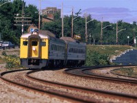 A RDC rounds the curve at the south end of Rockingham Yard.