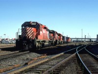 This power set is likely to go on a westbound unit train, either in Alyth Yard or out west of town in Kieth Yard. The Robot car will control the trailing engine after being put 2/3 into the train.
The track veering to the right is the MacLeod sub..