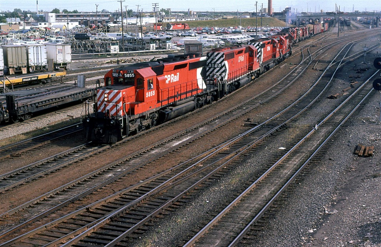I was invited up into the cabin at 12 Street East by an operator that must have been only a couple years older than I at the time. He was very accommodating, nd patient with my numerous questions. Unfortunately, I did not record his name....
I don't know, for certain, why CP was sending these trains west with so many engines. Perhaps it had something to do this the construction at Kicking Horse and Rogers Passes. The grade-reduction projects were nearly (?) complete at Kicking Horse, but on-going at Rogers.