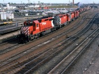 I was invited up into the cabin at 12 Street East by an operator that must have been only a couple years older than I at the time. He was very accommodating, nd patient with my numerous questions. Unfortunately, I did not record his name....
I don't know, for certain, why CP was sending these trains west with so many engines. Perhaps it had something to do this the construction at Kicking Horse and Rogers Passes. The grade-reduction projects were nearly (?) complete at Kicking Horse, but on-going at Rogers.  