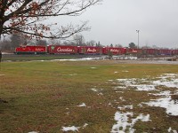 The 2014 CP Holiday Train stops in MacTier for its performance on a soggy and grey November afternoon. Mild temperatures and rain have removed almost all of the near 4' of snow that had been on the ground contributing to the Christmas atmosphere just a few days previously, much to my disappointment.