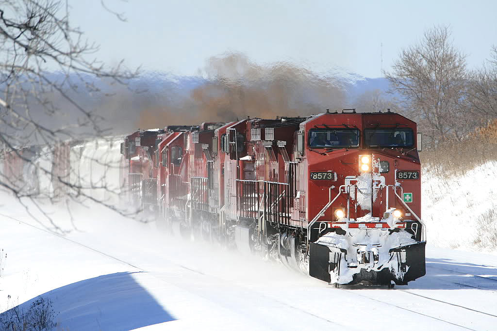 The day after a snow storm moved across Southern Ontario on the first weekend of March break 2008 ....CP slung togther 6 units to get this train over the CN Oakville Sub to Canpa
