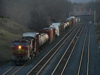 A great way to round out a day....a pair of BNSF (Santa Fe lettered) B40's pull an eastbound CN freight down the new track 3 east of Snake