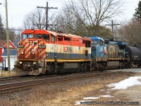 Lead engine BC Rail 4622 and a rare blue CN 2461 are finishing the last curve crossing Market Street as they enter Paris Junction. Once they arrive at the western end (Nith Road), they will uncouple from their train and perform some switching duties before continuing westbound.