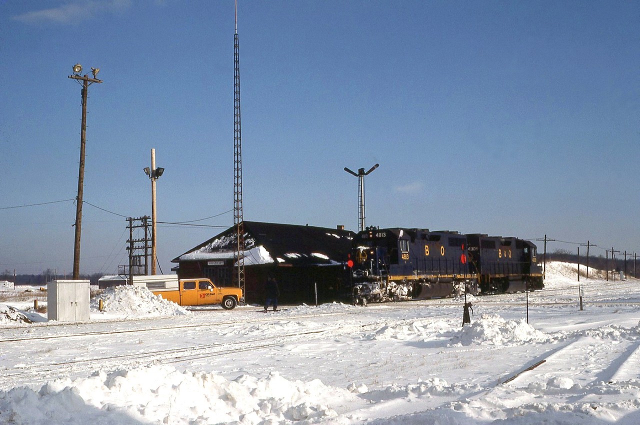 A clear wintery day at Guelph Junction finds "The Goderich" wayfreight sitting in front of the old station, with a pair of leased blue Baltimore & Ohio GP38's on today's train: 4813 and 4809. Always a little power short, the B&O's were among the variety of power leased at the time by CP, which also included Chessie and GO units.

More at Guelph Junction:
Leased UP FA1/FB1's in 1964: http://www.railpictures.ca/?attachment_id=16939
The "Pickup" with solid CP power being hooped up orders: http://www.railpictures.ca/?attachment_id=16593
SOO F-units westbound: http://www.railpictures.ca/?attachment_id=15563