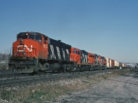 This was likely the last time I saw an MLW M420W leading a train. CNR 3543 leads a trio of GP9RMs with Toronto - Niagara Falls train #449 which could usually be counted on the show up in Burlington mid-morning. 