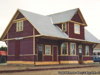 On a family vacation in the Ottawa Valley, my surprise was when we arrived in Barry's Bay to find this gem. At the time of this photo, the tracks had been removed for maybe a year or two...and the station was in the early stages of restoration (it's end use was a Tourist Information Center). This station is the last remaining of it's style along this portion of the line (originally built by the Ottawa, Arnprior & Parry Sound Railway). Many more had already been demolished at Killaloe, Wilno, Carp, etc. Today, where the tracks once were laid, is now a small park. Of note - also from the days of railroading, the water tower still stands at Barry's Bay. as it was a junction point for lines branching off to not only Renfrew, but to Pembroke as well as all points in between. 