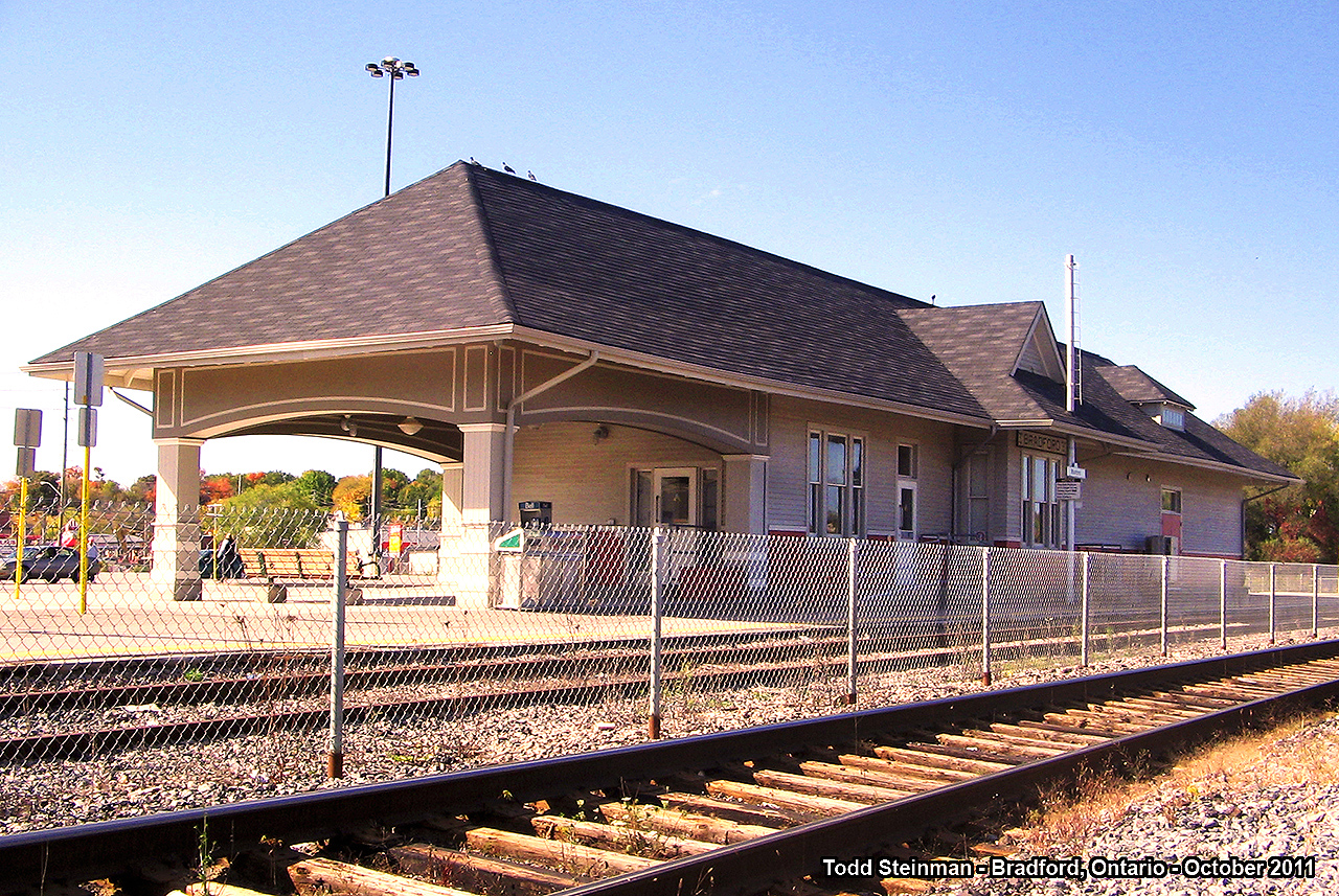 HAPPY THANKSGIVING!  Five years ago, on a family adventure to Schomberg - I was able to stop in Bradford so I could capture the newly renovated ex-CN / GO station. Metrolinx has performed other restorations in Aurora, and more recently, with the old Allandale station in Barrie. Seems Metrolinx is doing something right - at least in this area in regards to the preservation of railway stations.