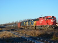 After sitting in Detroit for a few hours the night before and a CP SD60 added on to lead after passing the Chesterton railcam, CP 650 arrives in Guelph Jct. as the sun rises.