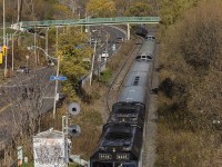 The Canadian snakes through Don Valley after a long trip across Canada from Vancouver. As it's arriving to Toronto on the Bala, the train rolls alongside Bayview Ave and the abandoned Don Branch now covered in grass.