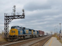 A pair of CSXT EMD's (CSXT 4569 & CSXT 8614) lead CN 327 through Dorval.