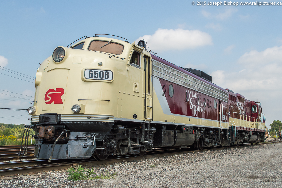 OSR 6508 and OSR 1620 rest outside the station at Woodstock while their crew enjoys their lunch and waits on the passing of CP 550.
