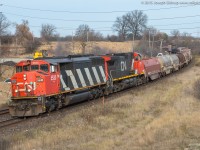 CN 331 leans into the curve at Garden Ave with CN 5530 and CN 2616 providing the horsepower today.  The sun came out just in time for the train and complemented the nice and clean SD60F nicely.