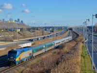 VIA 911 leads a westbound through the Turcot section of Montreal.