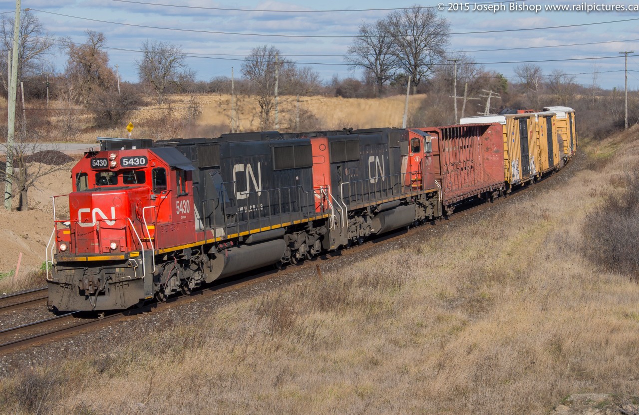 For the second time in one week I found myself standing up on the bridge at Garden Avenue outside of Brantford waiting on CN 331.  On this day 331 had SD60 5430 in the lead which was good enough reason for me to go for a drive between classes on a chilly but lovely Friday.