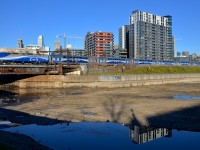 <b>Last inbound of the morning.</b> AMT 809, the last inbound train during the morning on AMT's Mont St-Hilaire line is 5 minutes away from tieing up at Montreal's Central station as it passes Wellington tower.