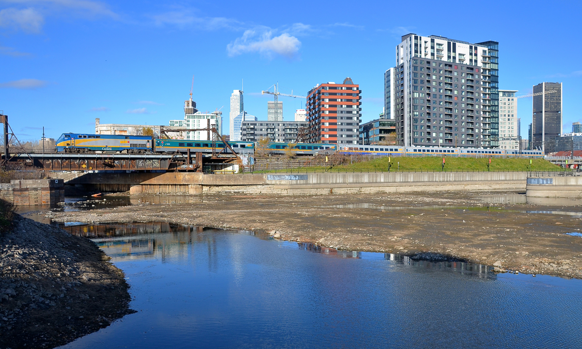 Class leader. Class leader for VIAs' P42DC's VIA 900 leads VIA 22 for Quebec City past Wellington Tower.