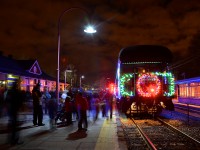 <b>Tail end of the holiday train.</b> The tail end of the Canadian edition of the CP Holiday Train is stopped in front of the venerable Montreal West station as the train makes its first stop of the year before continuing west towards its next stop at Beaconsfield. Bringing up the rear is the heavyweight car <i>Van Horne</i>, built by CP in 1927.