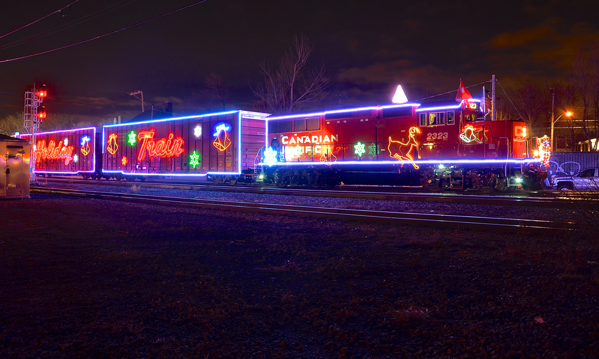 Head end of the holiday train. The head end of the Canadian edition of the CP Holiday Train is stopped is stopped just past the Westminter crossing as the train makes its first stop of the year before continuing west towards its next stop at Beaconsfield. Power this year is CP 2323.
