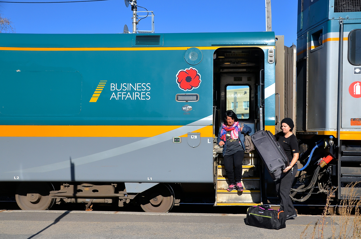 'In Flanders fields the poppies blow'. Tomorrow is Remembrance Day, which is the anniversary of the First World War Armistice. The symbol of Remembrance Day in Canada is the Poppy, commemorated in John McCrae's poem 'In Flanders Fields'. This year VIA Rail has put a poppy on all of there business cars, as here on this VIA 1 car which is stopped at Dorval.